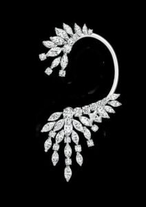 piaget diamond ear cuff surrounds the ear in…